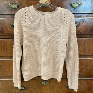 Pink metallic sweater.